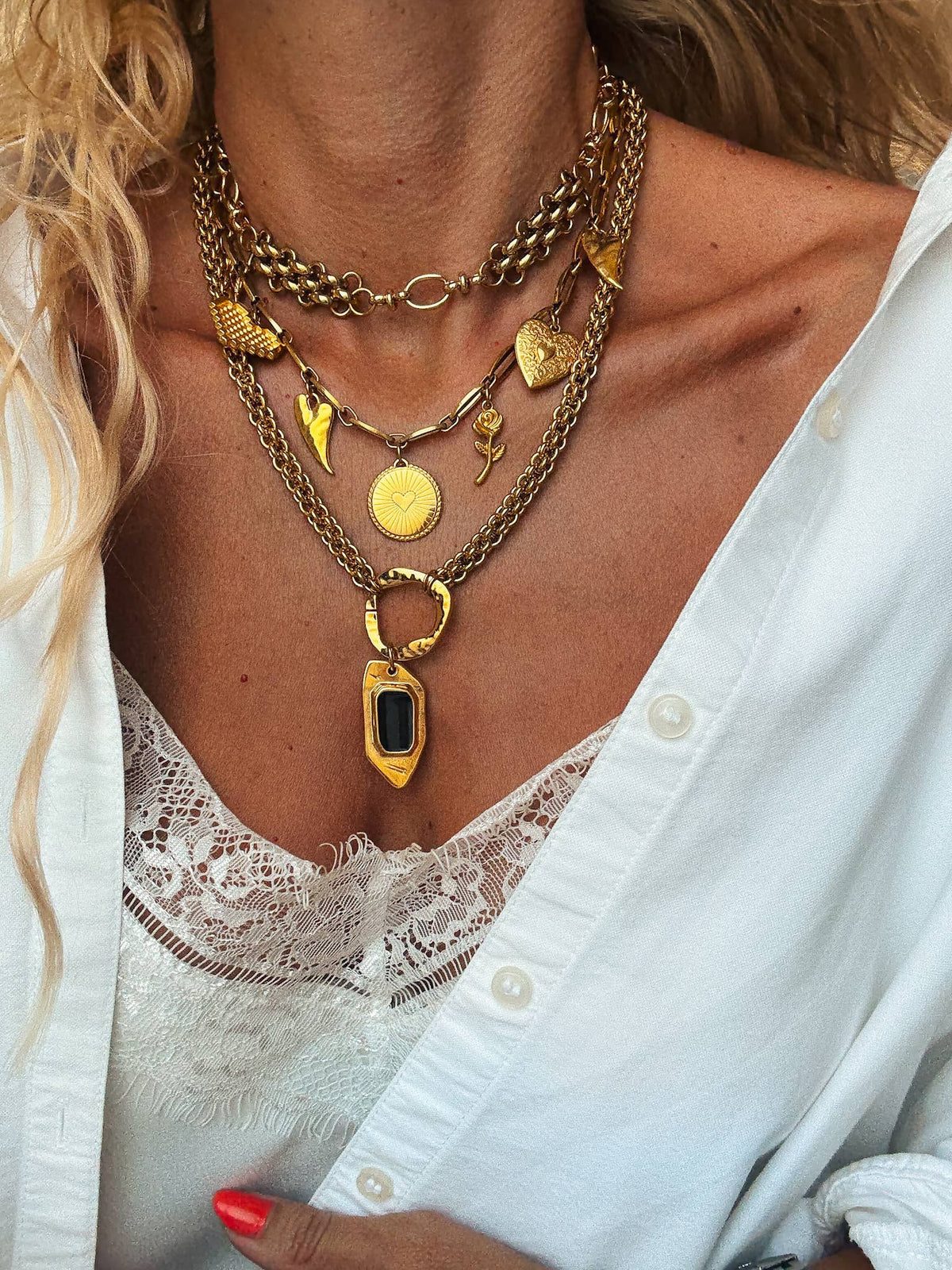 Statement gold charm necklaces with chunky chains