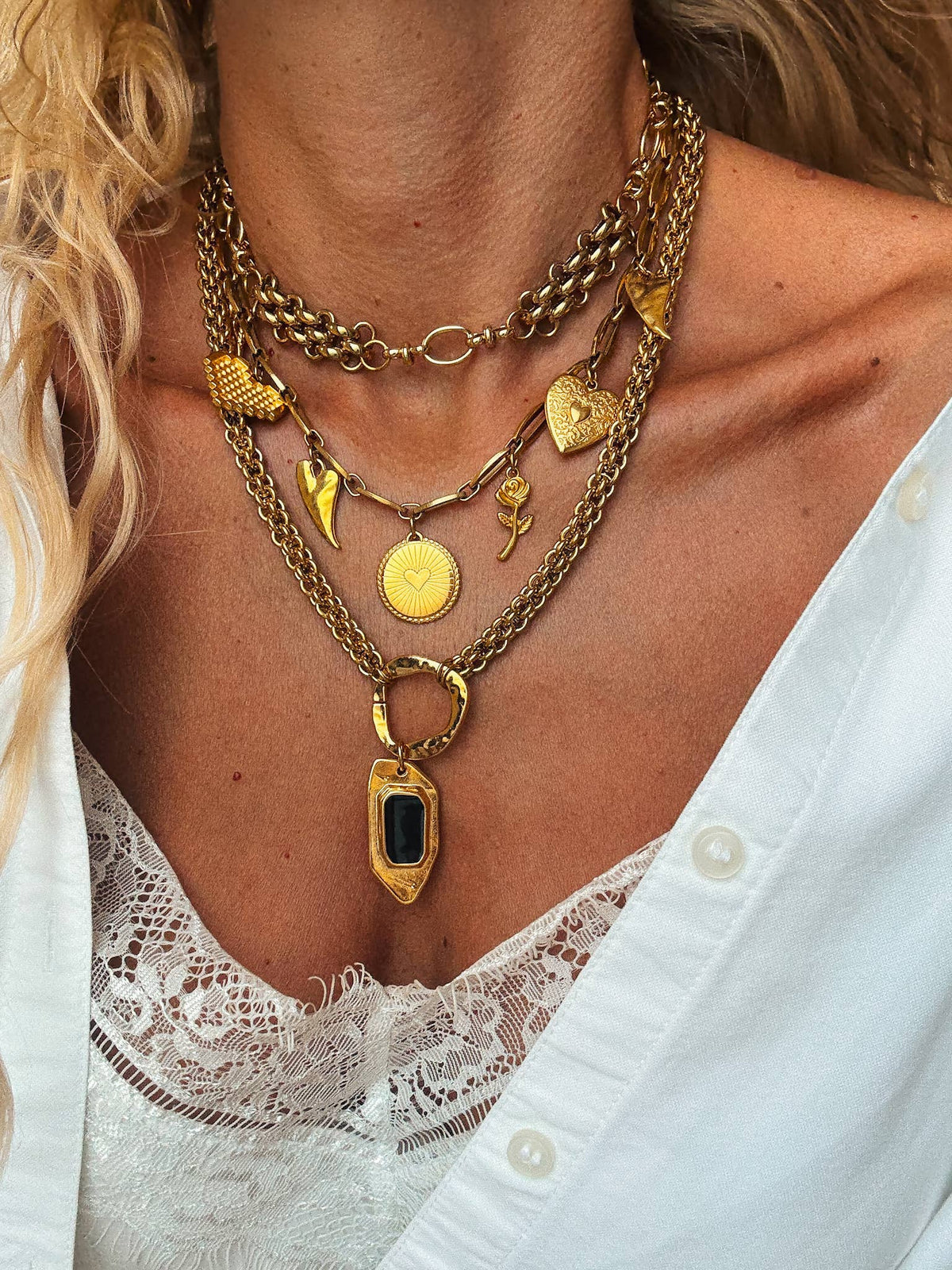 Statement gold charm necklaces with chunky chains
